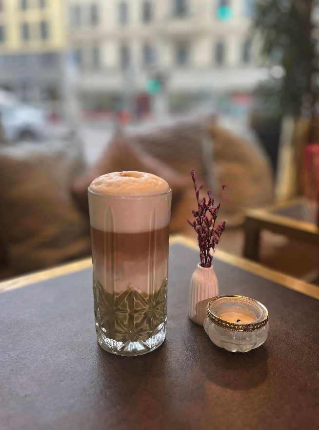 Latte macchiato in a tall glass